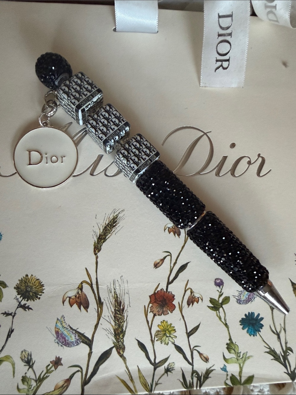 Handmade beaded pen with charm and cubes